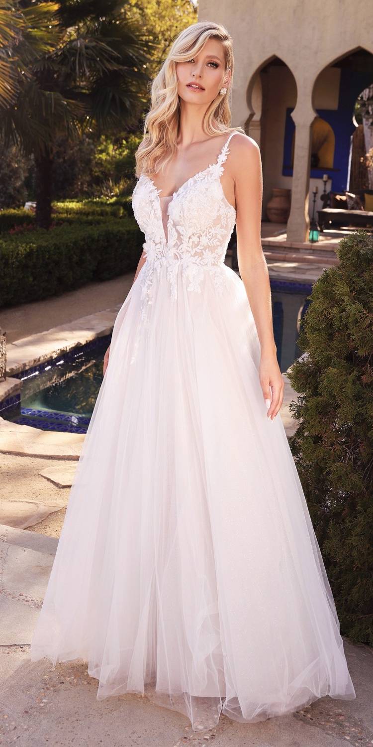 Off-white layered tulle bridal gown with embroidered bodice and A-line skirt, thin straps
