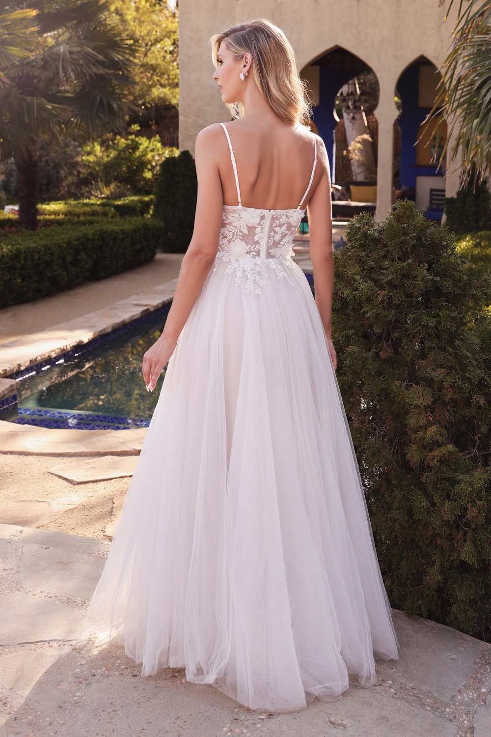 Off-white layered tulle A-line bridal gown with embroidered bodice and thin shoulder straps