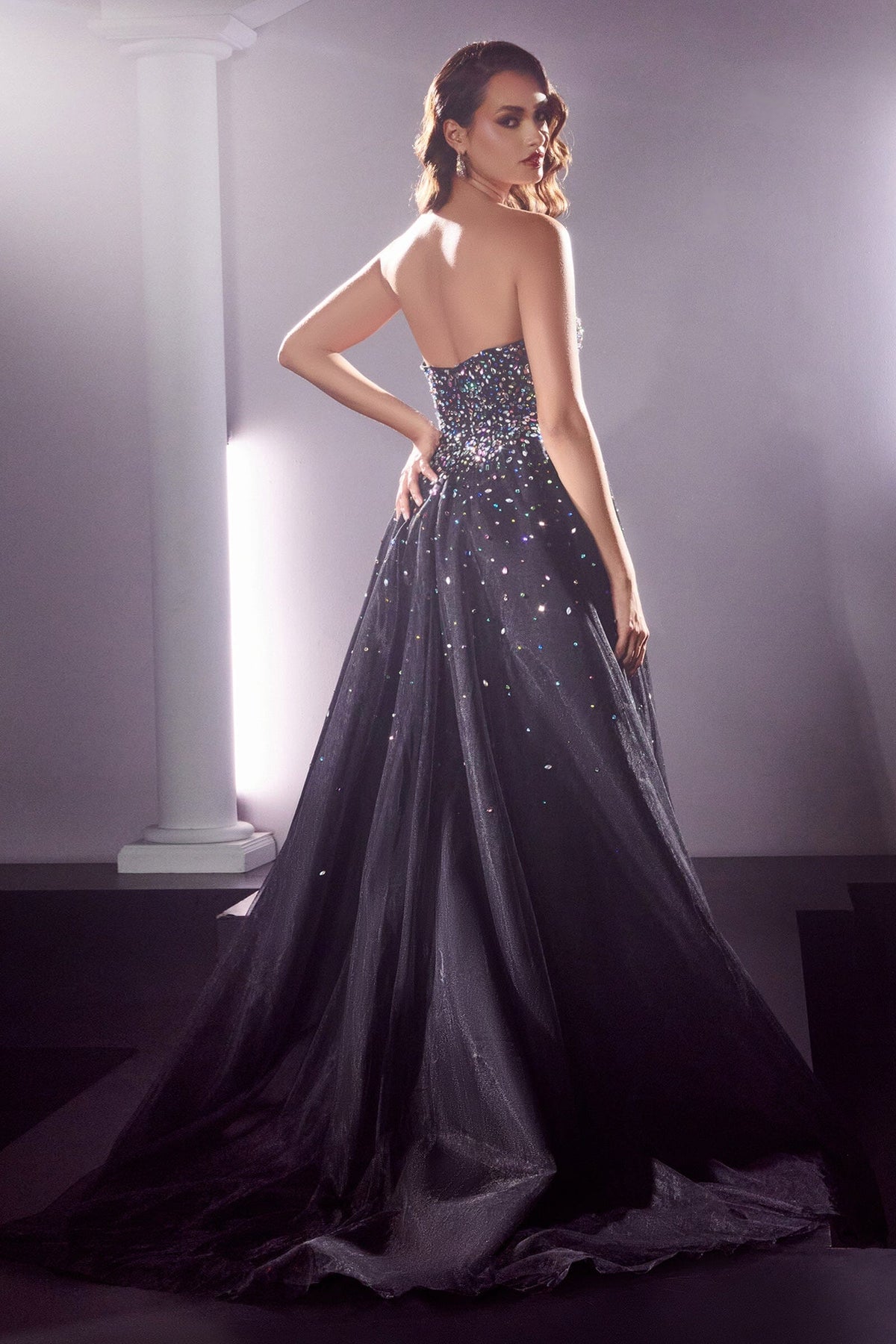Black strapless long formal gown with fitted jewel-studded bodice
