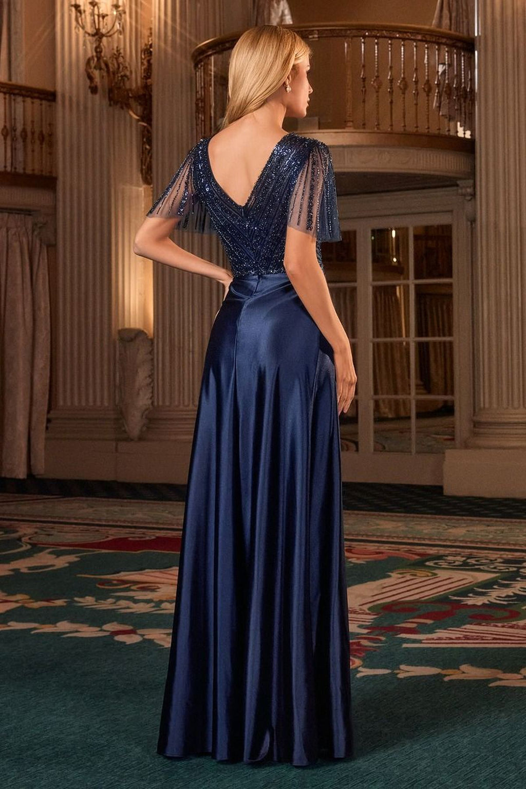 Navy satin A-line evening gown with V-neck and back beaded flutter sleeves