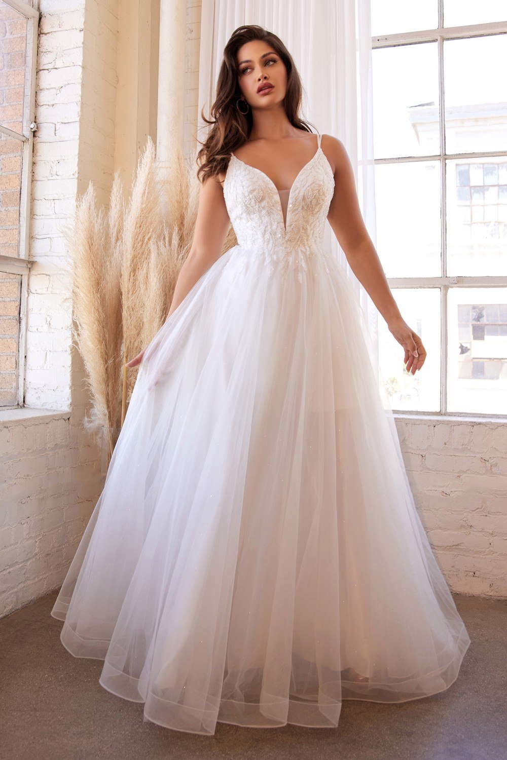Off-white tulle long dress with layered skirt, beaded bodice, and thin spaghetti straps
