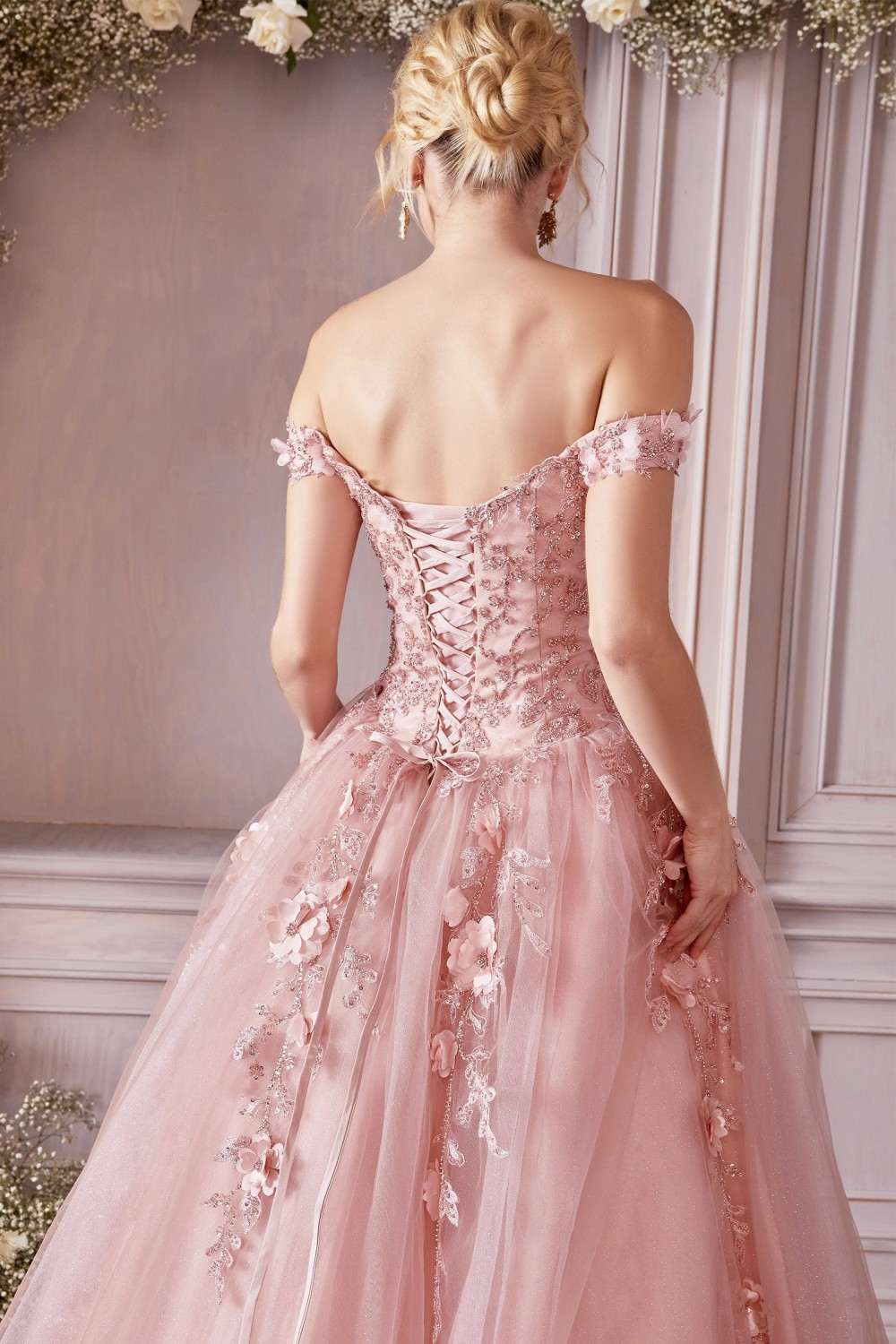 Off-shoulder layered tulle ball gown in blush pink with lace-up open back