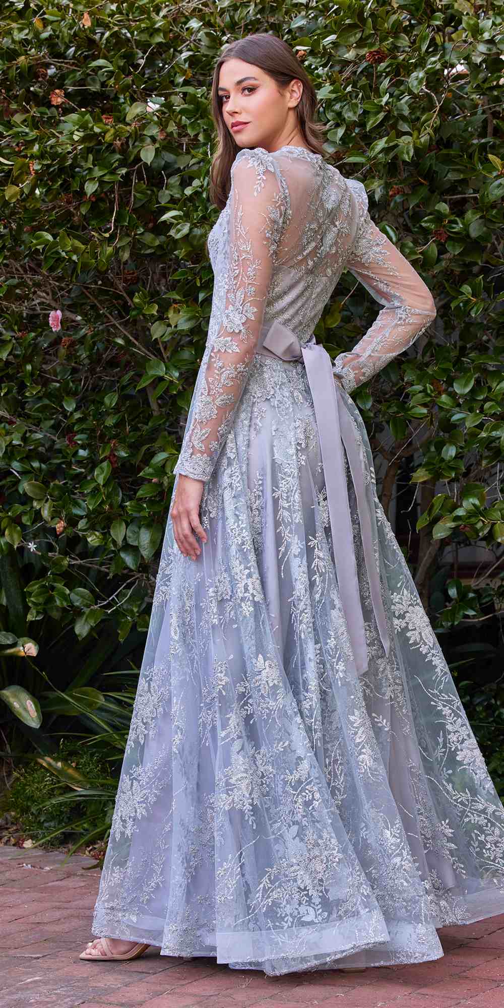 Smokey blue long-sleeve embellished ball gown with fitted waist and flared lace skirt