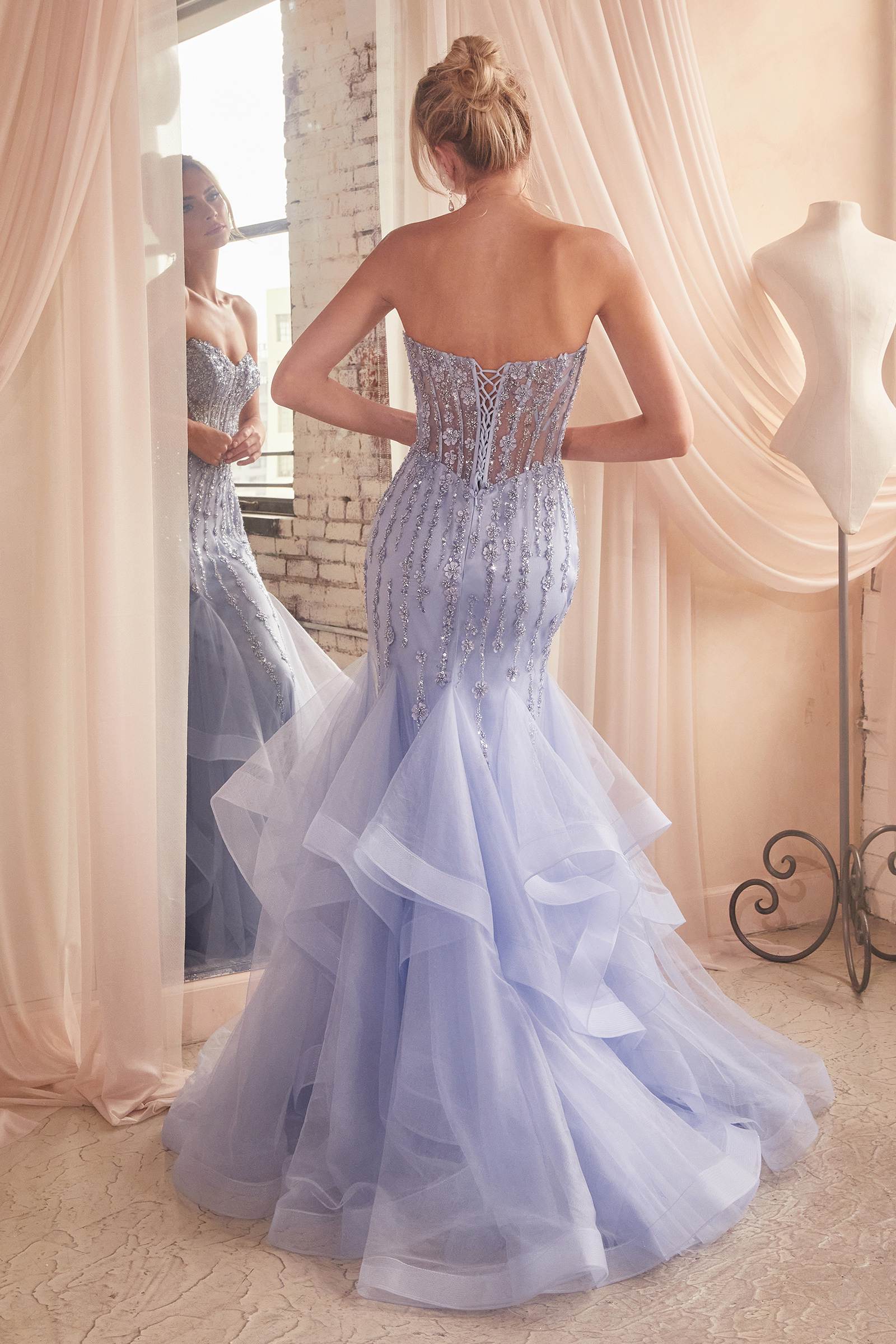 Lavender-blue tiered tulle mermaid gown, corset back, ruffled flared skirt