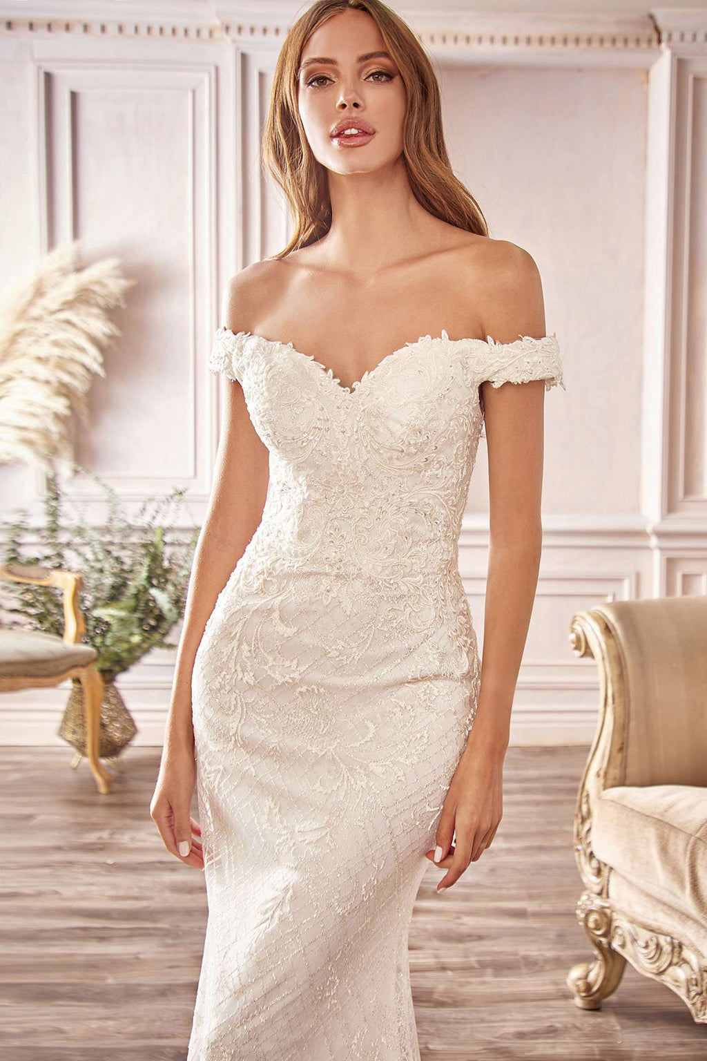 Off-white off-shoulder bridal gown with lace bodice and textured fitted skirt