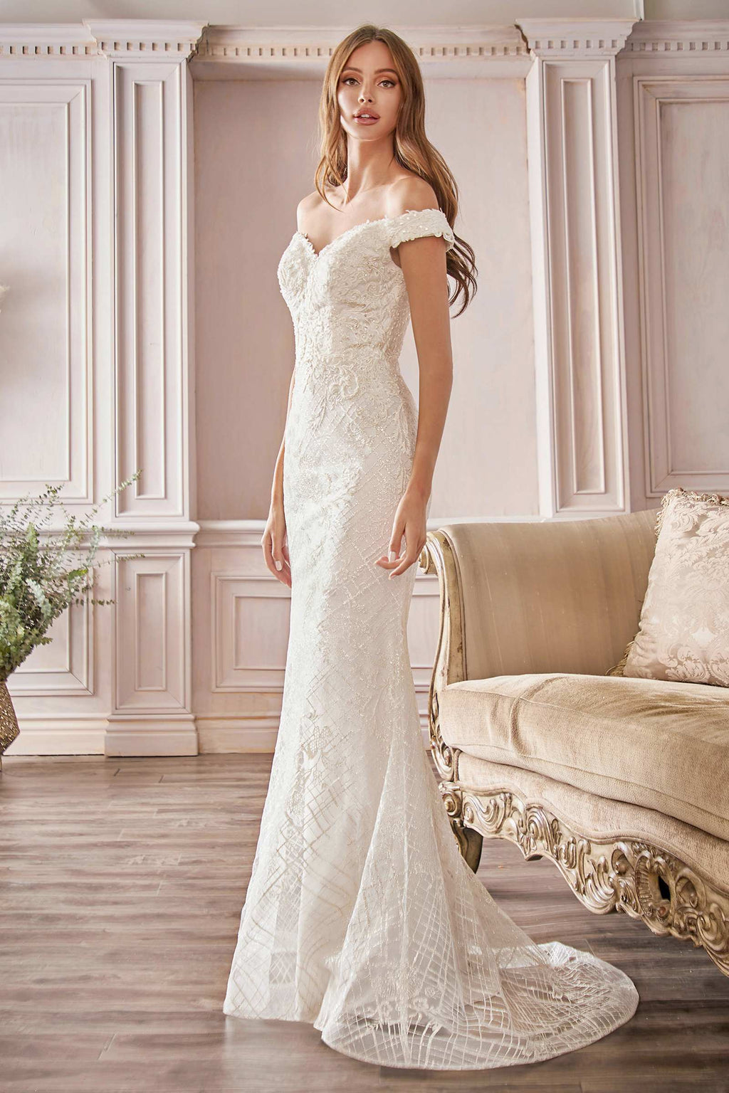 Off-white fitted off-shoulder bridal gown with lace texture and floor-length mermaid hem