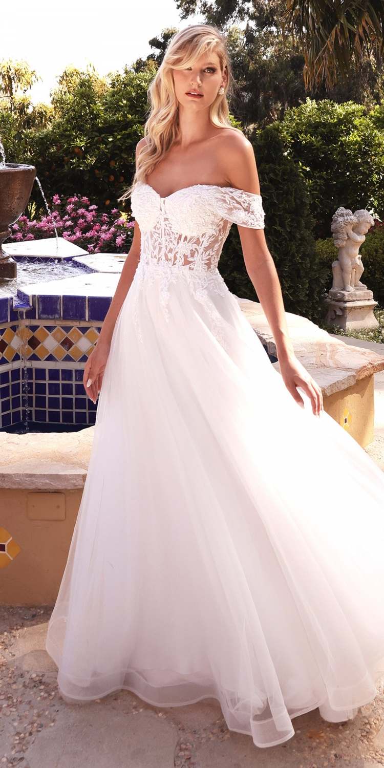 Off-white off-shoulder lace bridal gown with fitted bodice and flared tulle skirt