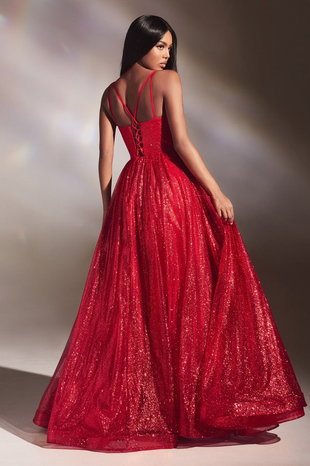 Red glitter ball gown with spaghetti straps and open back, full A-line skirt