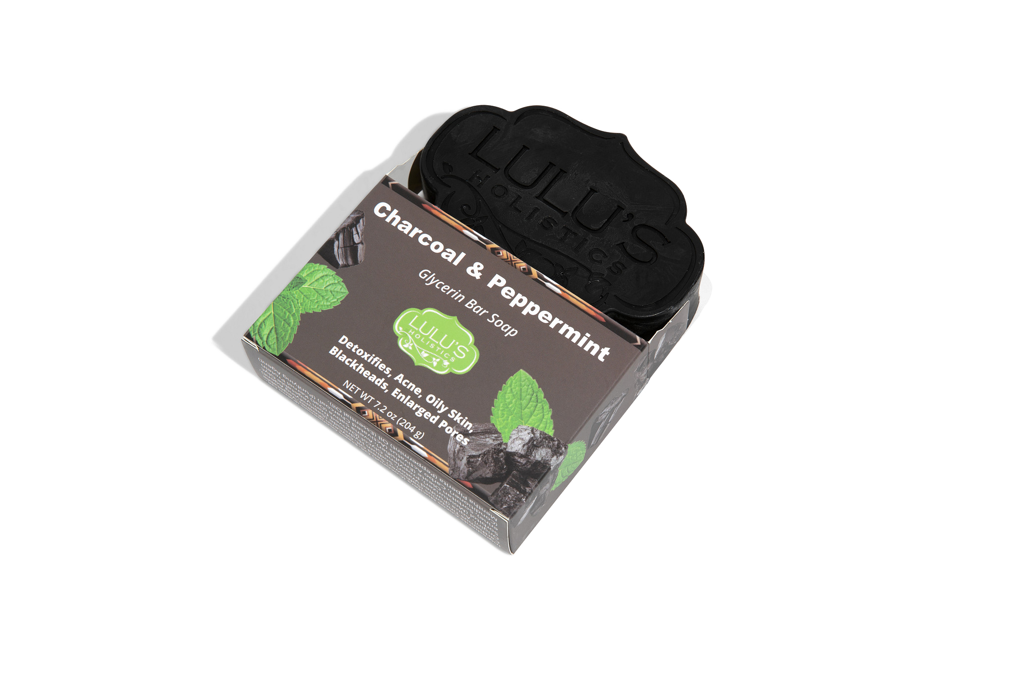 Glycerin bar soap in box, dark charcoal black flower-shaped bar with embossed logo