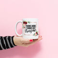 White coffee mug with floral frame and text 'Thanks mom I turned out awesome'