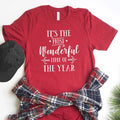 Red unisex graphic Christmas T-shirt with white text: “It’s the most Wonderful time of the year”