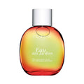 Clarins Eau des Jardins fragrance spray bottle, amber-to-green gradient glass