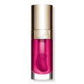 Clarins lip comfort oil in raspberry pink tube with gold cap