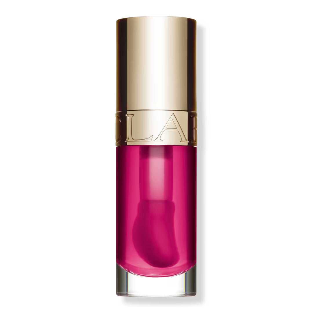 Clarins lip comfort oil in raspberry pink tube with gold cap