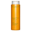 Bath and shower concentrate bottle, amber orange with white cap, Clarins