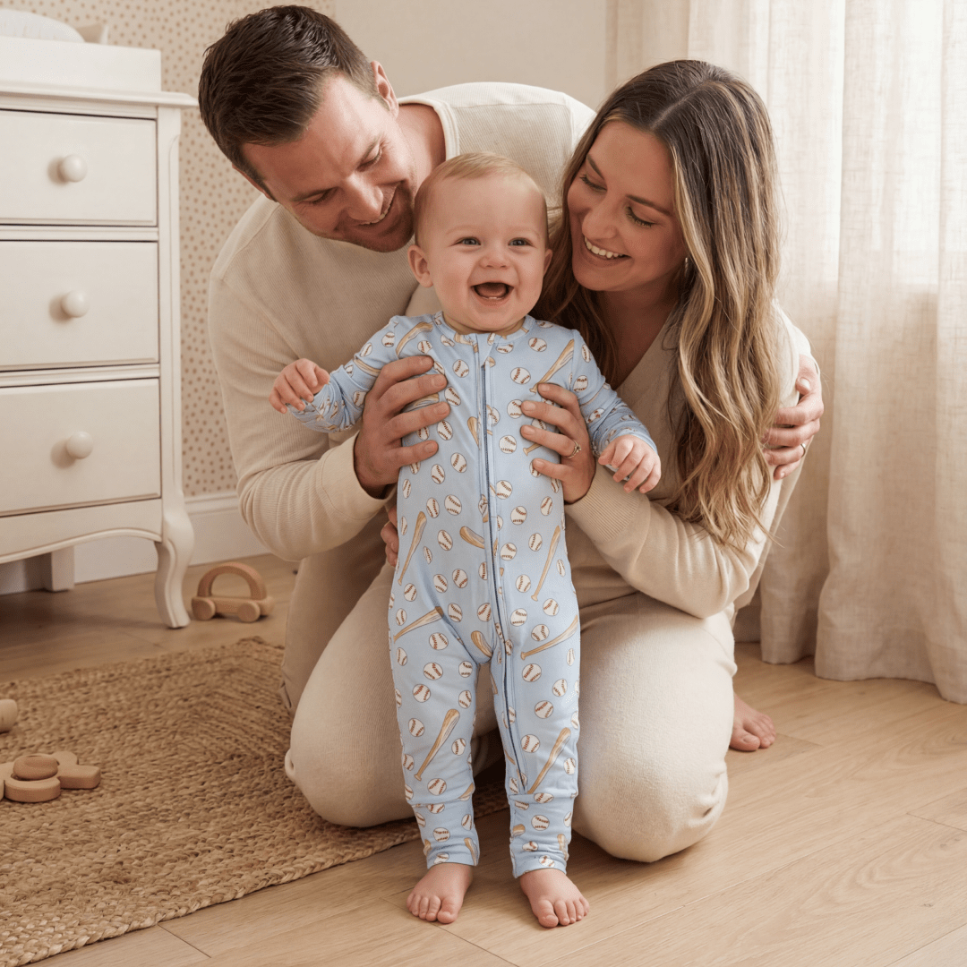 Light blue baseball-print romper, long sleeves, button front