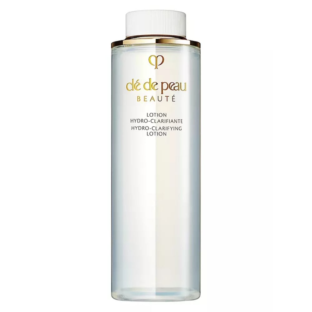 Cle de Peau Beaute hydro-clarifying lotion bottle, clear liquid, white cap