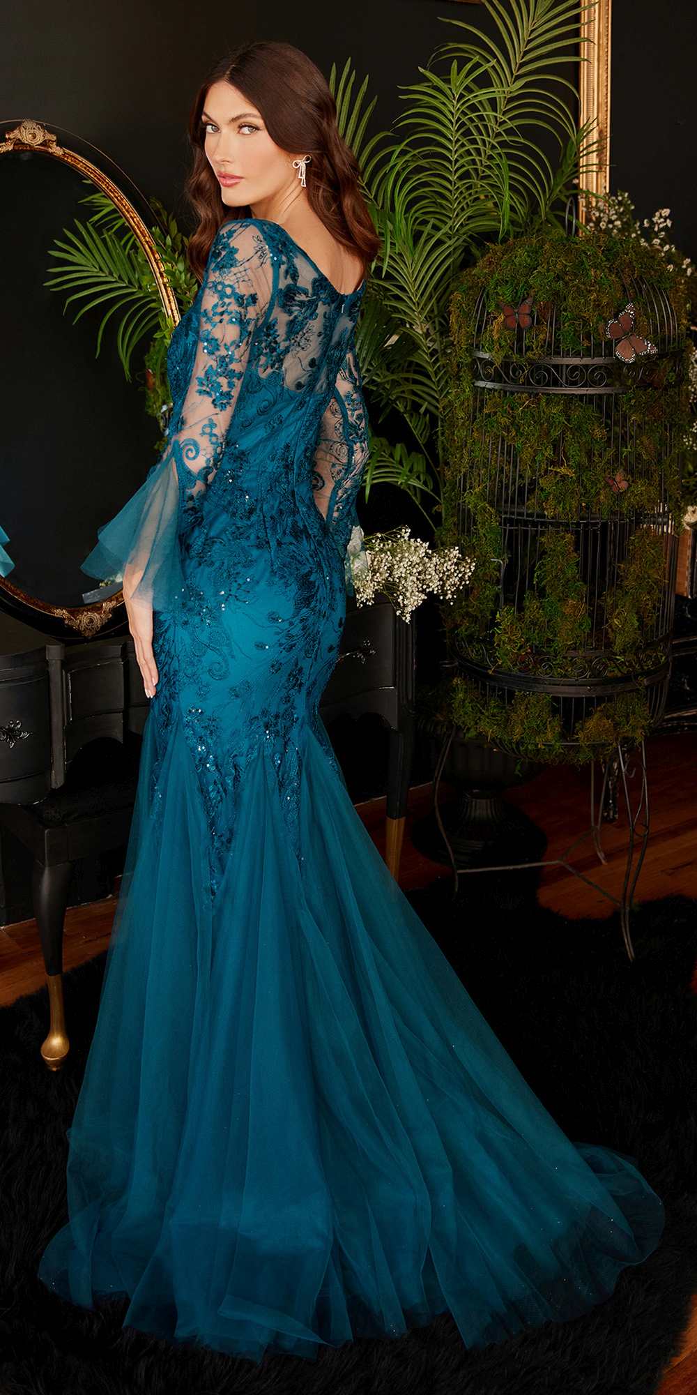 Peacock-blue mermaid gown with long bell sleeves and embellished bodice, V-neckline