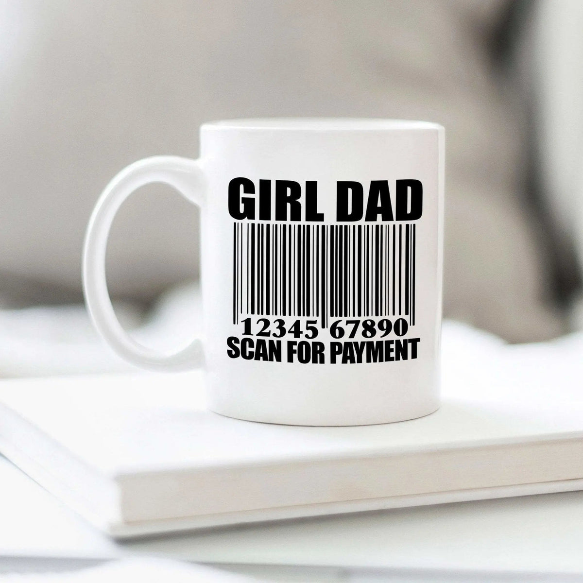 White ceramic coffee mug with 'GIRL DAD' graphic and 'SCAN FOR PAYMENT' barcode