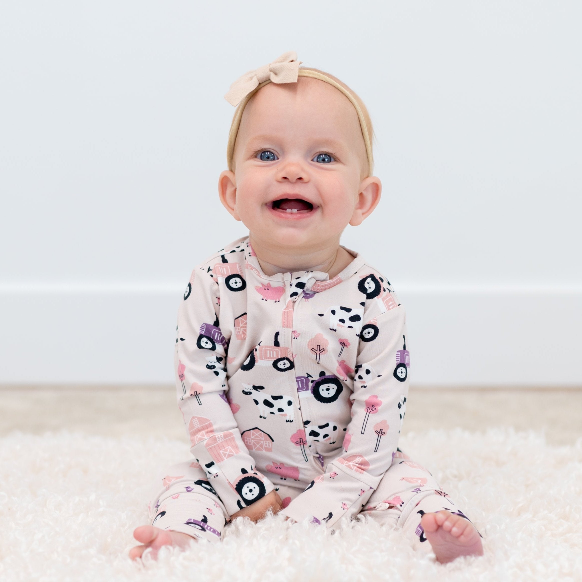 Baby girl farm print footie romper, light pink/white, long sleeves, zip front
