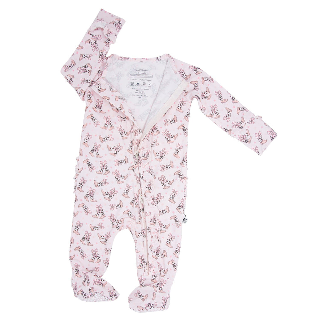 Girls pink long-sleeve footie with bow-and-boots print, front zipper, ruffle cuffs