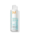 moroccanoil Curl Enhancing Conditioner bottle, white plastic with orange M logo