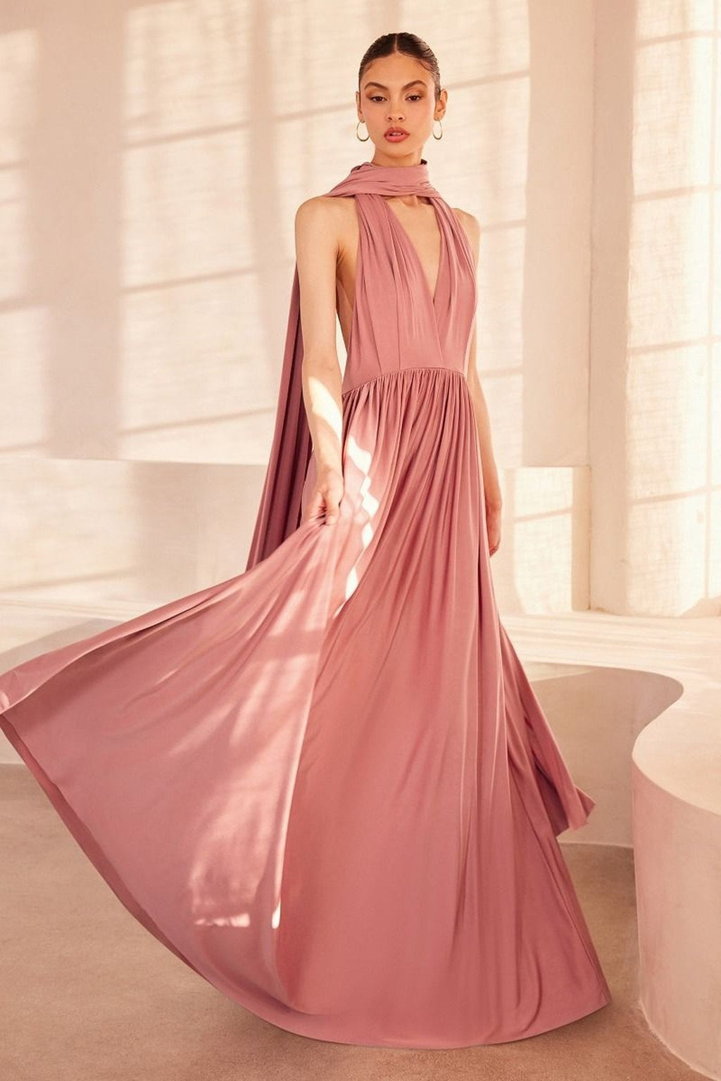 Dusty mauve sleeveless halter maxi dress with draped bodice and flowing skirt