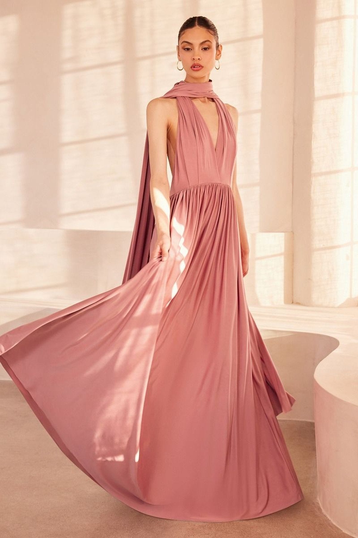 Dusty mauve sleeveless halter maxi dress with draped bodice and flowing skirt