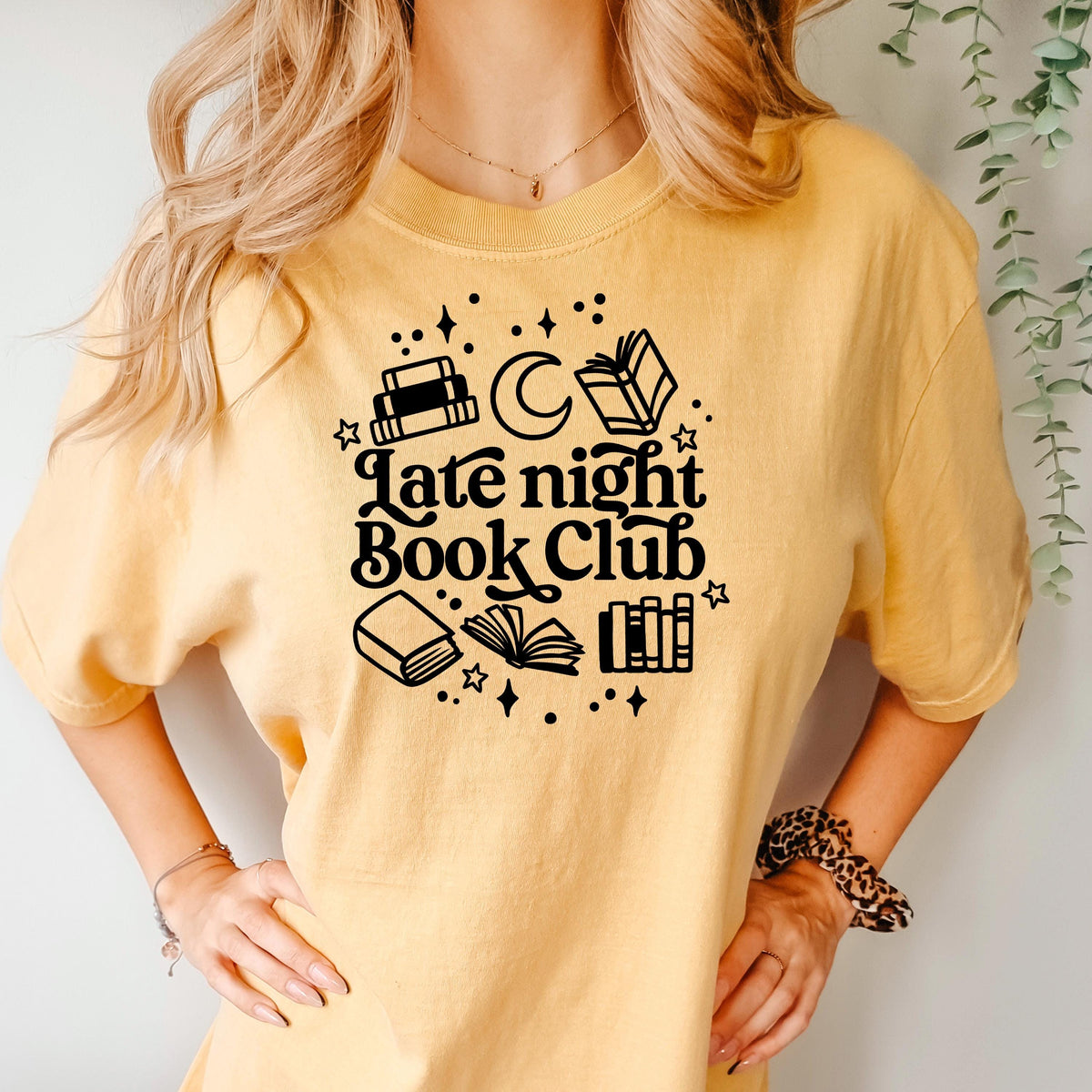 Mustard yellow crewneck tee with 'Late night Book Club' books and moon graphic
