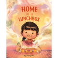 Hardcover children's book cover with illustrated girl and lunchbox; 'HOME in a LUNCHBOX'.