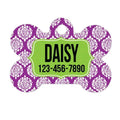 Purple damask dog bone tag with Daisy and phone number on green nameplate