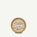 Davines More Inside shine wax jar with gold lid and pink patterned label, 75 mL