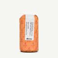 Davines hair oil bottle, orange with logo and label, 250 mL