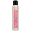 Davines shimmering mist bottle with black cap, metallic gold finish and pink label