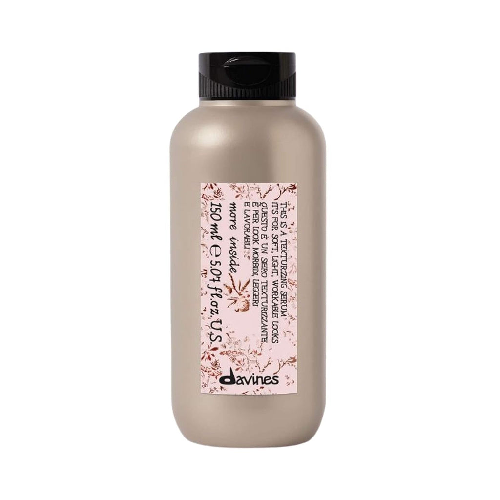 Davines This Is a Texturizing Serum bottle, opaque beige, black cap