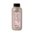 Davines This Is a Texturizing Serum bottle, opaque beige, black cap