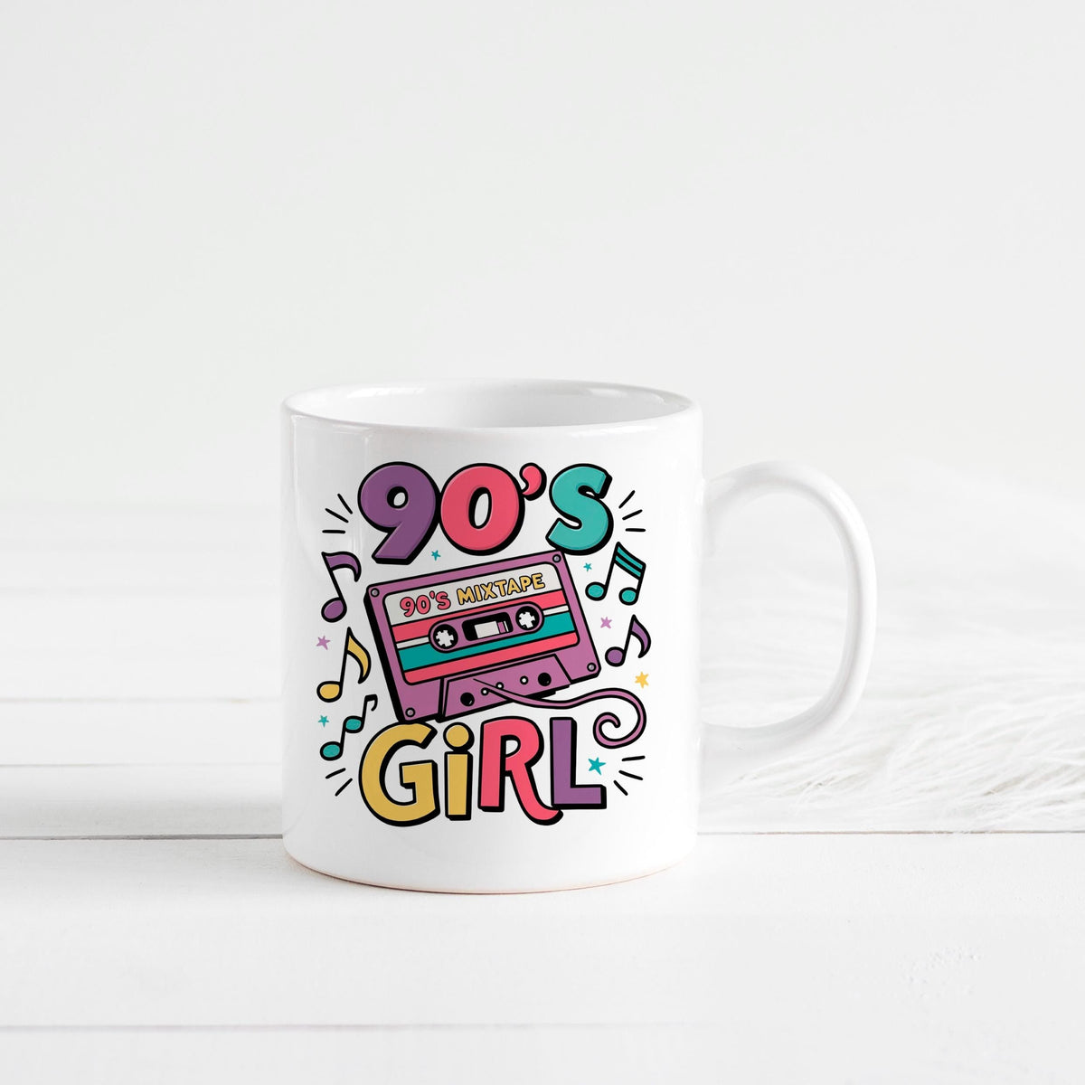 White ceramic mug with 90's Girl cassette tape design and music icons