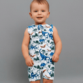 Toddler dinosaur tank romper, sleeveless, white fabric with blue and green jungle print.