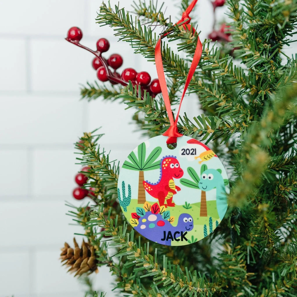 Dinosaur Christmas ornament with red ribbon, '2021' and 'JACK' on round design