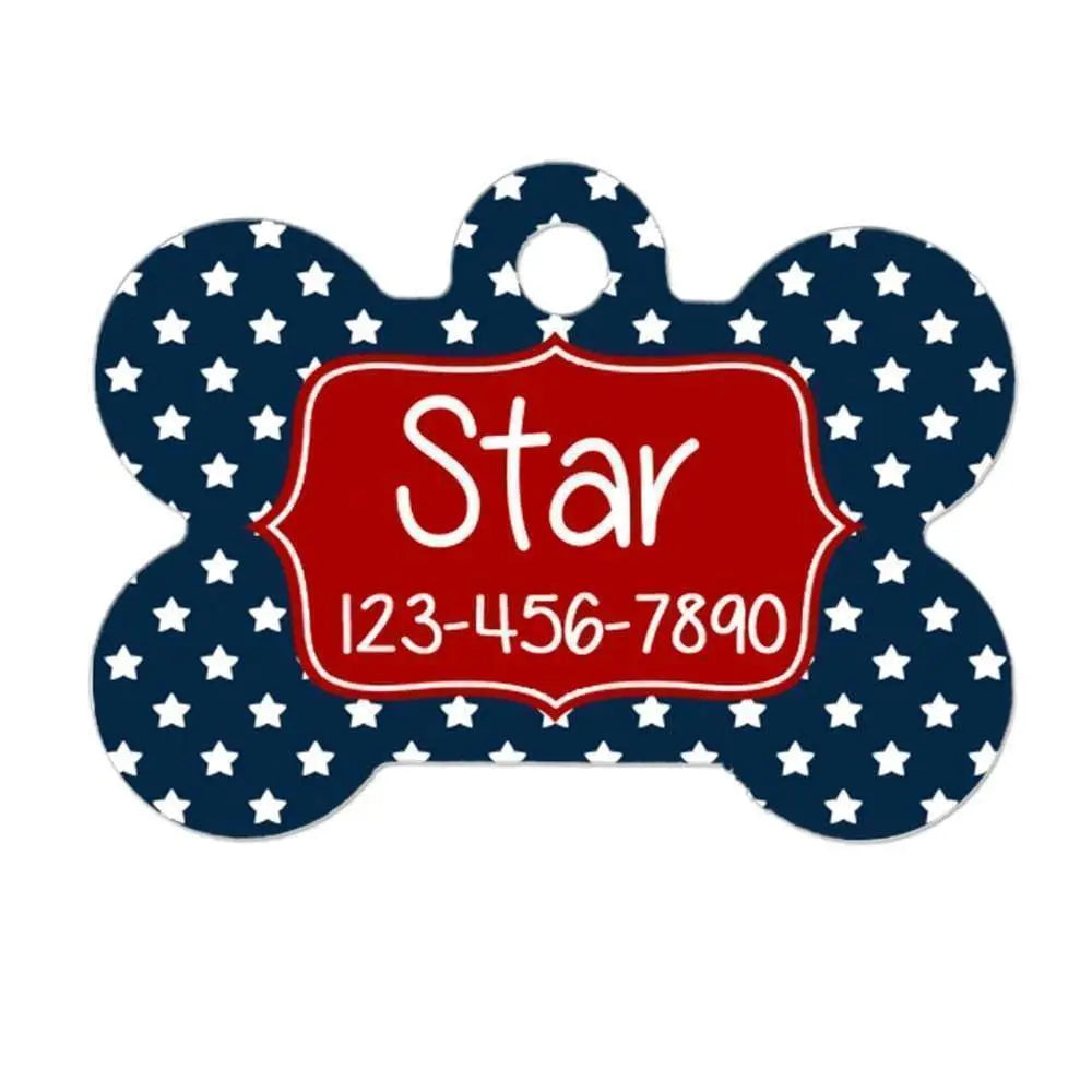Two-sided dog collar tag with navy star background and red nameplate, white text