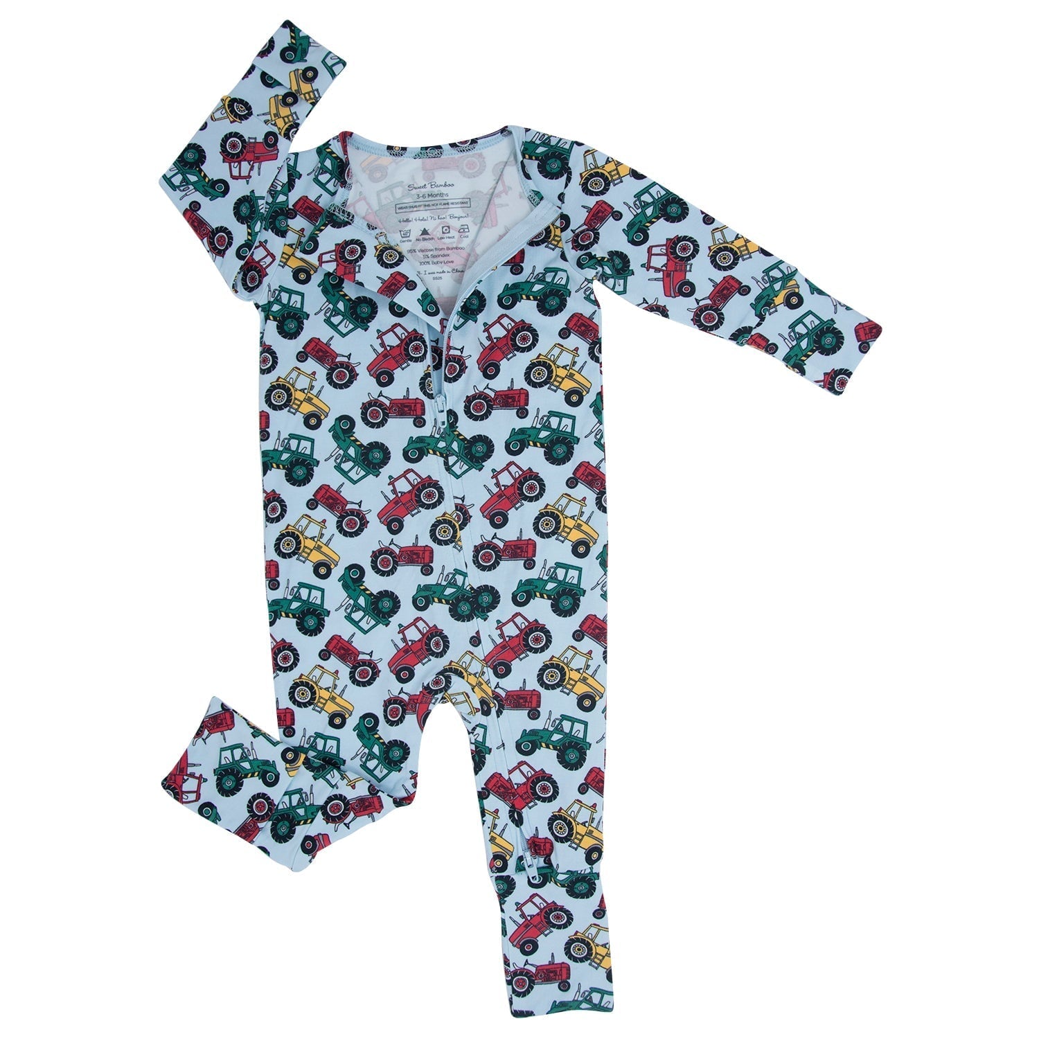 Tractor-print romper with long sleeves and button-front, colorful farm vehicle pattern