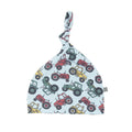Tractor print knot hat with all-over colorful farm vehicles pattern