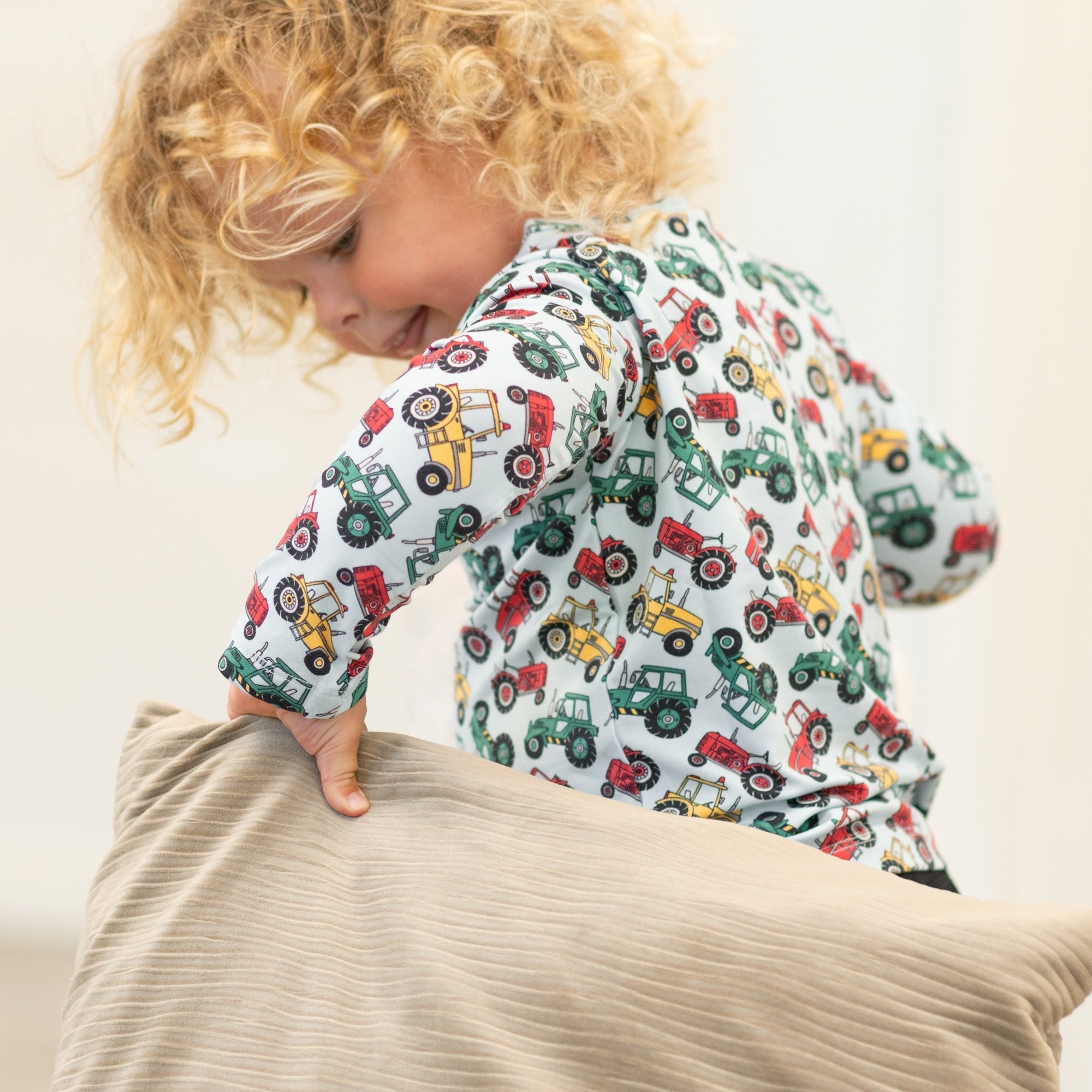 Boys raglan henley shirt with white tractor print and long sleeves