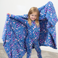 Girls kids pajama set in blue floral print, long-sleeve top and matching pants