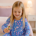 Girls' long-sleeve swirly dress in blue with pink and purple floral print