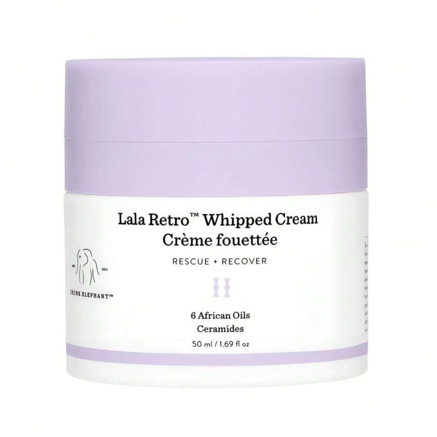 Drunk Elephant Lala Retro Whipped Cream jar with purple lid, white cream container