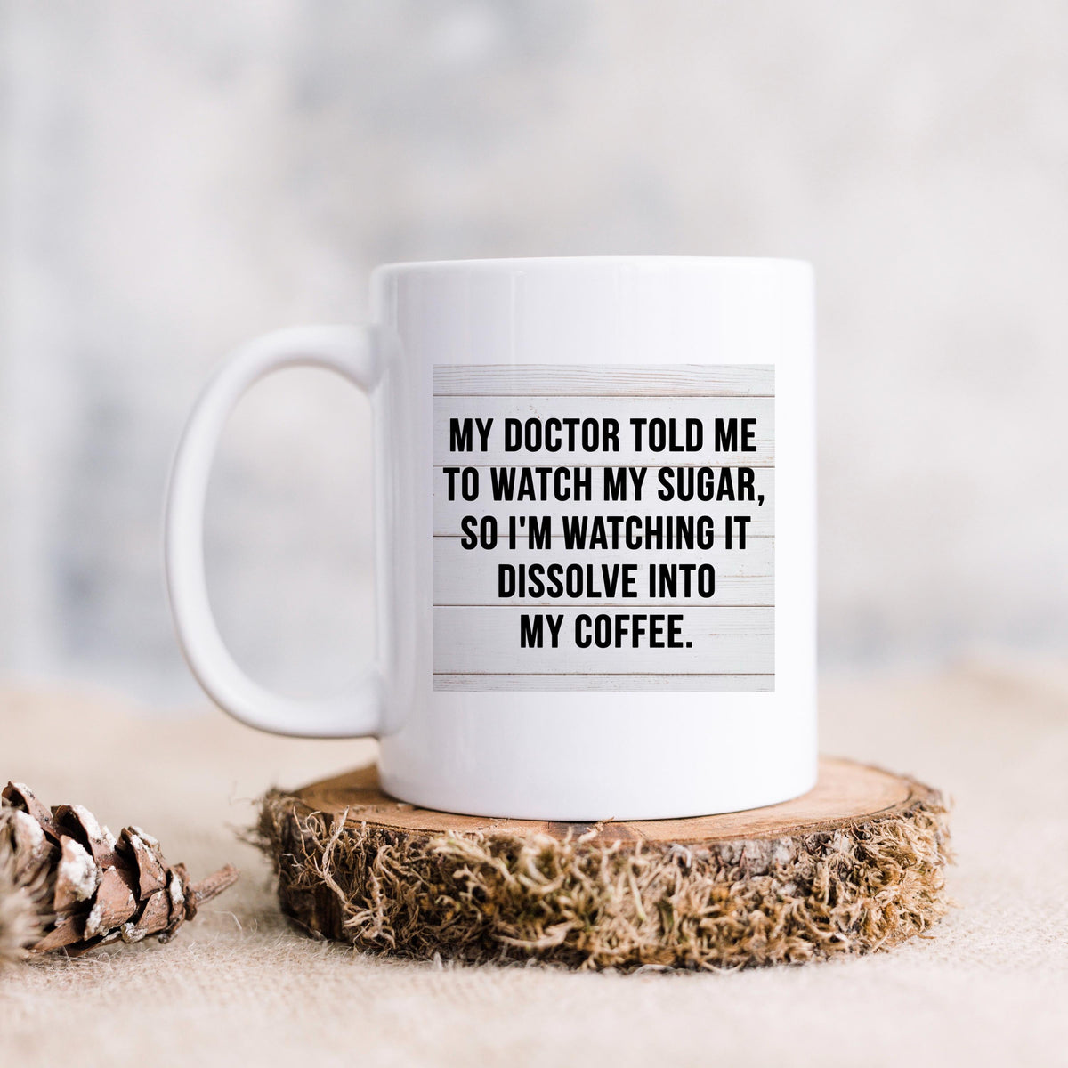 White coffee mug with doctor sugar-watch joke text on the front