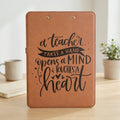 Rawhide brown leather clipboard with teacher quote design and metal clip hardware