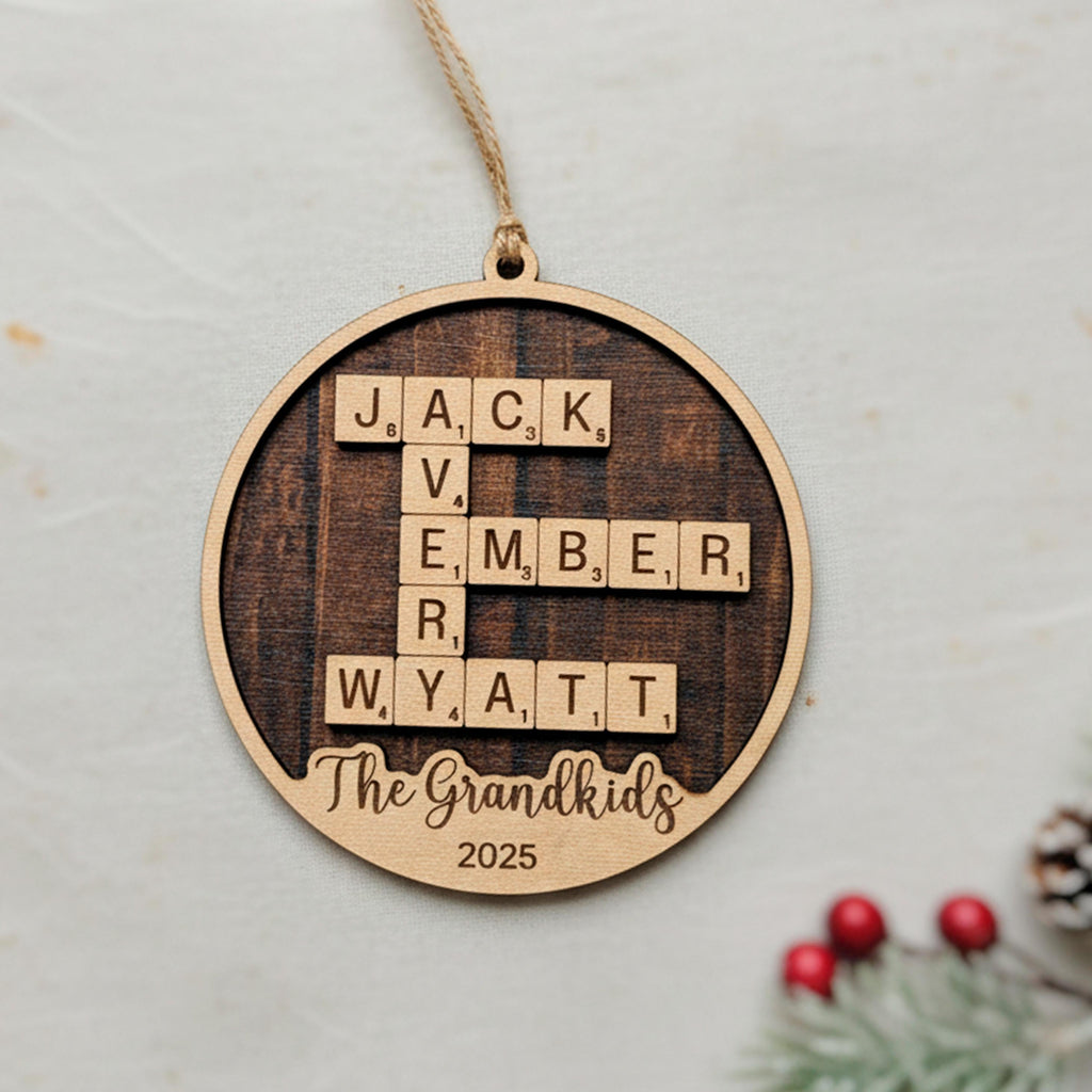 Personalized Christmas ornament with dark-brown frame, name letters, and 2025 date.