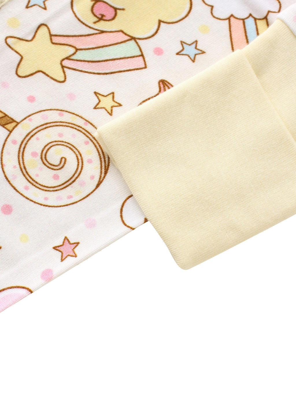 Cream ribbed sleeve cuff on a baby romper with rainbow snacks print